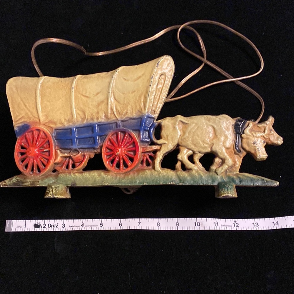 Antique Cast iron lamp. Wagon pulled by cows. Cowboys this one is for you!